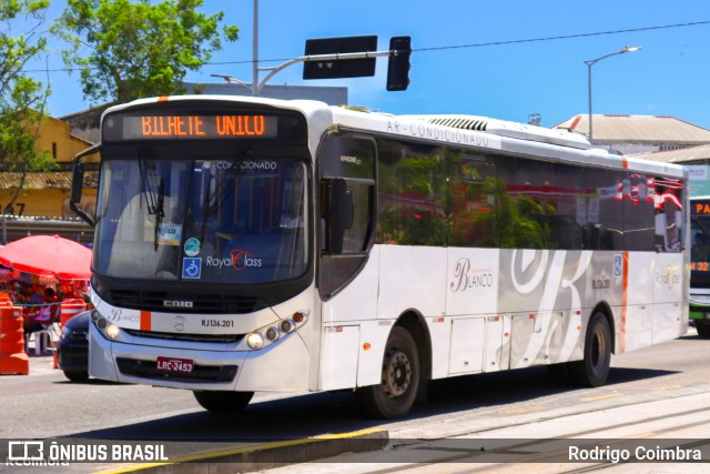 UniRio Transportes RJ 228.036 na cidade de Rio de Janeiro, Rio de Janeiro, Brasil, por Rodrigo Coimbra. ID da foto: 12063629.