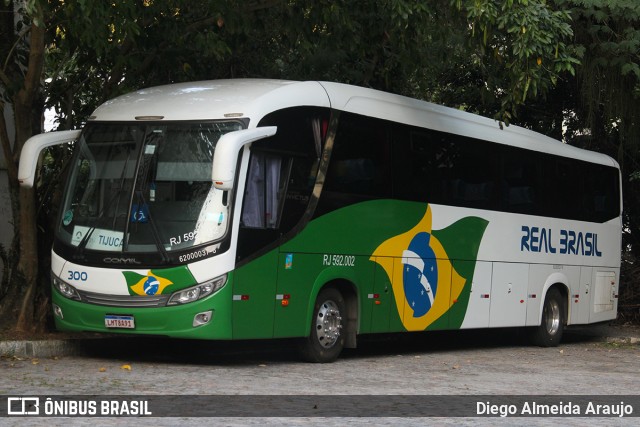 Real Brasil Turismo RJ 592.002 na cidade de Rio de Janeiro, Rio de Janeiro, Brasil, por Diego Almeida Araujo. ID da foto: 12080146.